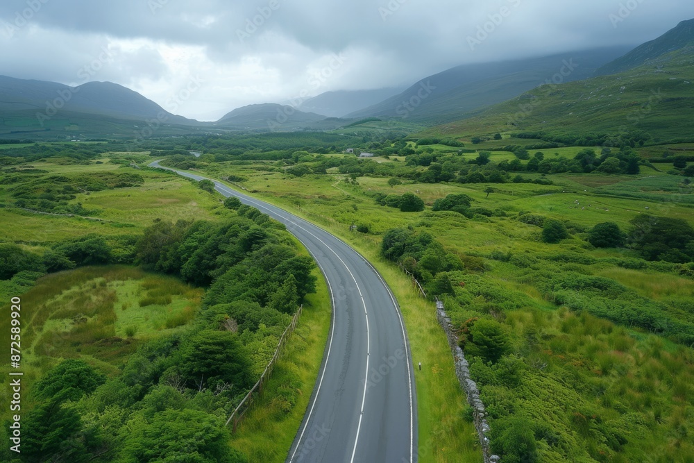Scenic drive along the Ring of Kerry, focusing on the winding roads, lush greenery, and distant mountains, using tracking shots and aerial views to highlight the journey Scenic drive along the Ring of Kerry, focusing on the winding roads, lush greenery, and distant mountains, using tracking shots and aerial views to highlight the journey