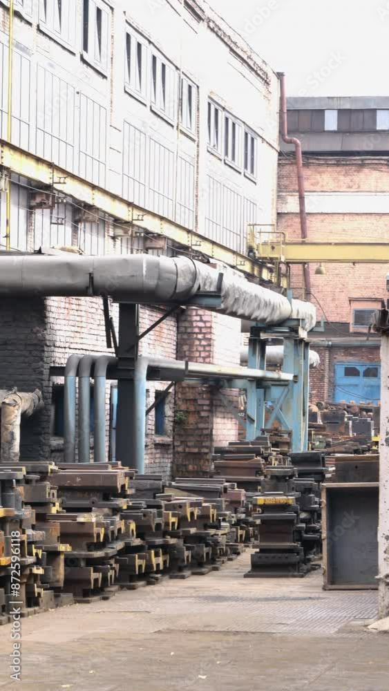 Production processing of metal blanks for remelting of metal stock. Retired scrap metal processing plant. Production requiring modernization, maintenance. Sloping walls, Vertival video torn insulation Production processing of metal blanks for remelting of metal stock. Retired scrap metal processing plant. Production requiring modernization, maintenance. Sloping walls, Vertival video torn insulation