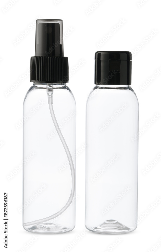Two Empty Clear Plastic Bottles With Black Caps Isolated on White Background Two Empty Clear Plastic Bottles With Black Caps Isolated on White Background