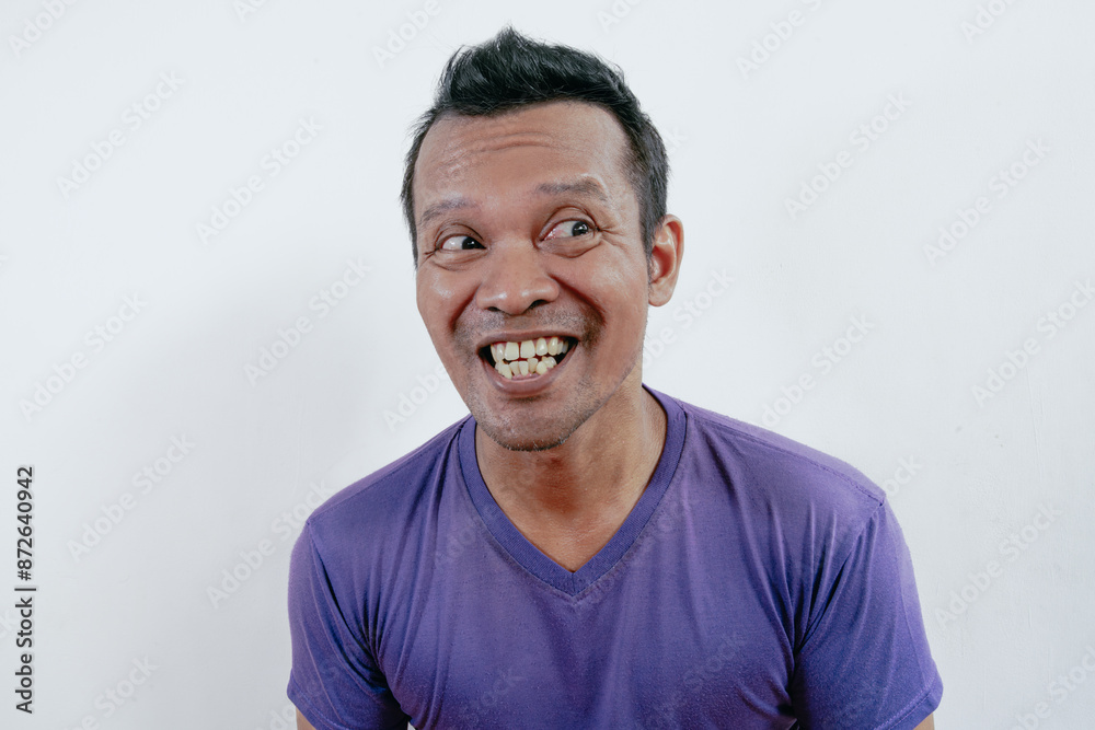 Funny and smiling playful teasing of Asian man acts isolated on white background. Funny and smiling playful teasing of Asian man acts isolated on white background.