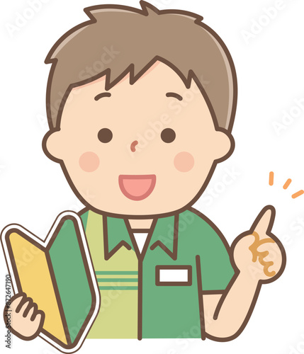 初心者マークを持ってポイントを説明するアルバイトの男性