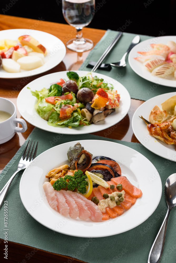 Korean buffet meal salad sushi dumpling fruit vegetable meat Korean buffet meal salad sushi dumpling fruit vegetable meat