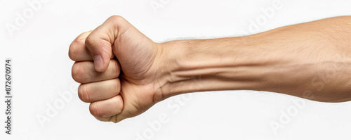 A man's arm is stretched out with his fist clenched. Concept of strength and determination