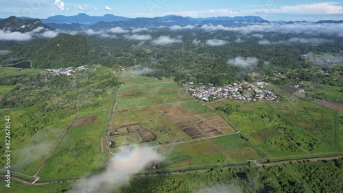 Kuching, Malaysia - July 4 2024: Aerial View of The Skuduk Paddy Field photo