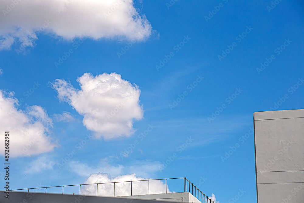 Fototapeta premium Top of building on new house with clear blue background