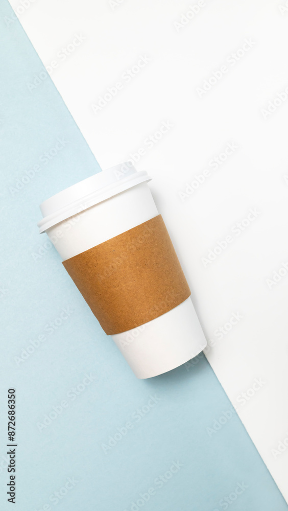 Mockup Paper Drinks Mug, Cup with White Lid and Corrugated Sleeve On White and Blue Background. Eco Hot Beverage Tumbler, Vertical Plane, Copy Space. On the Go Food Service Application Mockup Paper Drinks Mug, Cup with White Lid and Corrugated Sleeve On White and Blue Background. Eco Hot Beverage Tumbler, Vertical Plane, Copy Space. On the Go Food Service Application
