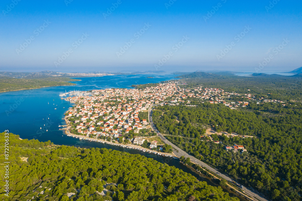 Fototapeta premium Aerial view of Adriatic town of Pirovac and main road, Dalmatia, Croatia