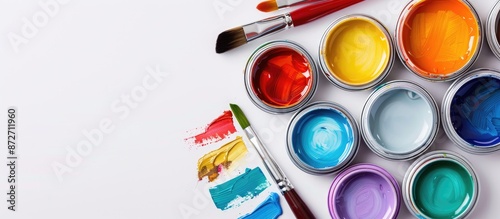 Wallpaper Mural Colorful gouache paint cans and artist brushes displayed on a white background with copy space image. Torontodigital.ca