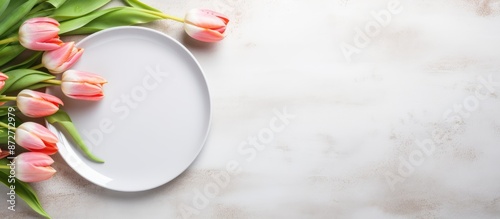 A white plate with cutlery ...