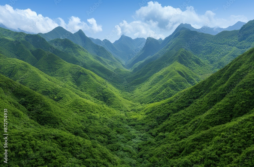 Lush green mountain landscape with cloudy sky Lush green mountain landscape with cloudy sky