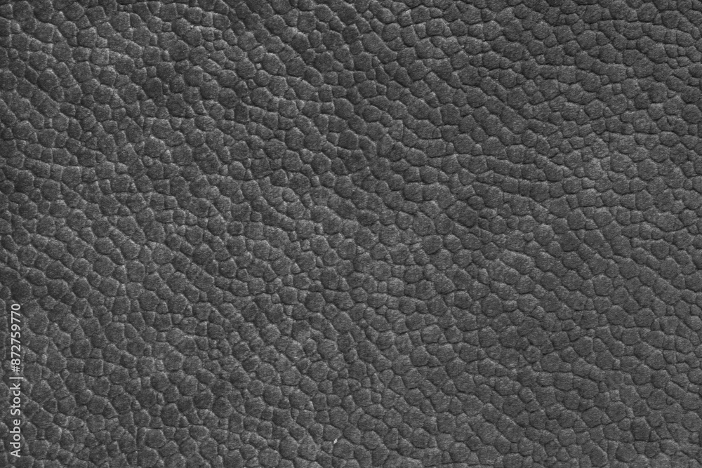 Velours black fabric with with embossed pattern like leather structure texture close up, macro Velours black fabric with with embossed pattern like leather structure texture close up, macro
