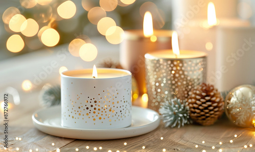 Festive Christmas Candles with Gold Ornaments, Candlelight and White Bokeh Lights, Xmas Decoration.