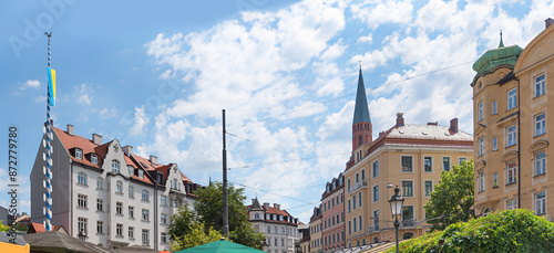 beautiful Wiener Platz, district Haidhausen, historical munich, blue sky with clouds