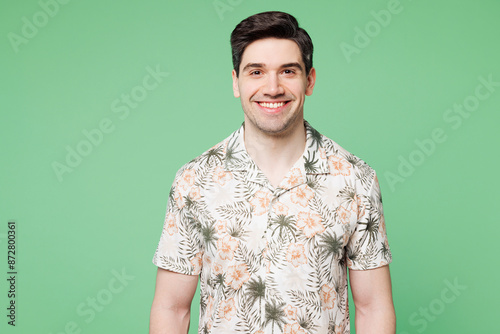 Wallpaper Mural Young smiling happy fun cheerful positive satisfied Caucasian man he wearing shirt casual clothes look camera isolated on plain pastel green color wall background studio portrait. Lifestyle concept Torontodigital.ca