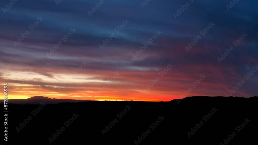 Aerial Panning Time Lapse Shot Of Silhouette Mountains In Desert Under Dramatic Cloudscape - Atacama Desert, Chile Aerial Panning Time Lapse Shot Of Silhouette Mountains In Desert Under Dramatic Cloudscape - Atacama Desert, Chile