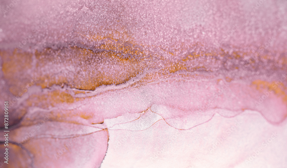 Fototapeta premium A close-up of an abstract painting featuring swirling patterns of purple and silver ink, creating a fluid and ethereal effect