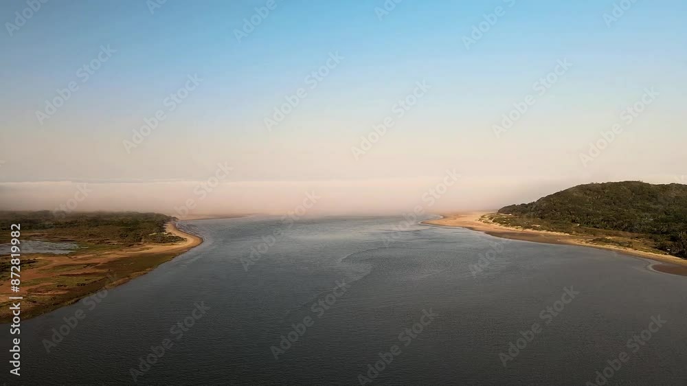 Stunning misty lagoon entering the sea at Kei Mouth - South Africa, aerial view. Serene, ethereal beauty Stunning misty lagoon entering the sea at Kei Mouth - South Africa, aerial view. Serene, ethereal beauty
