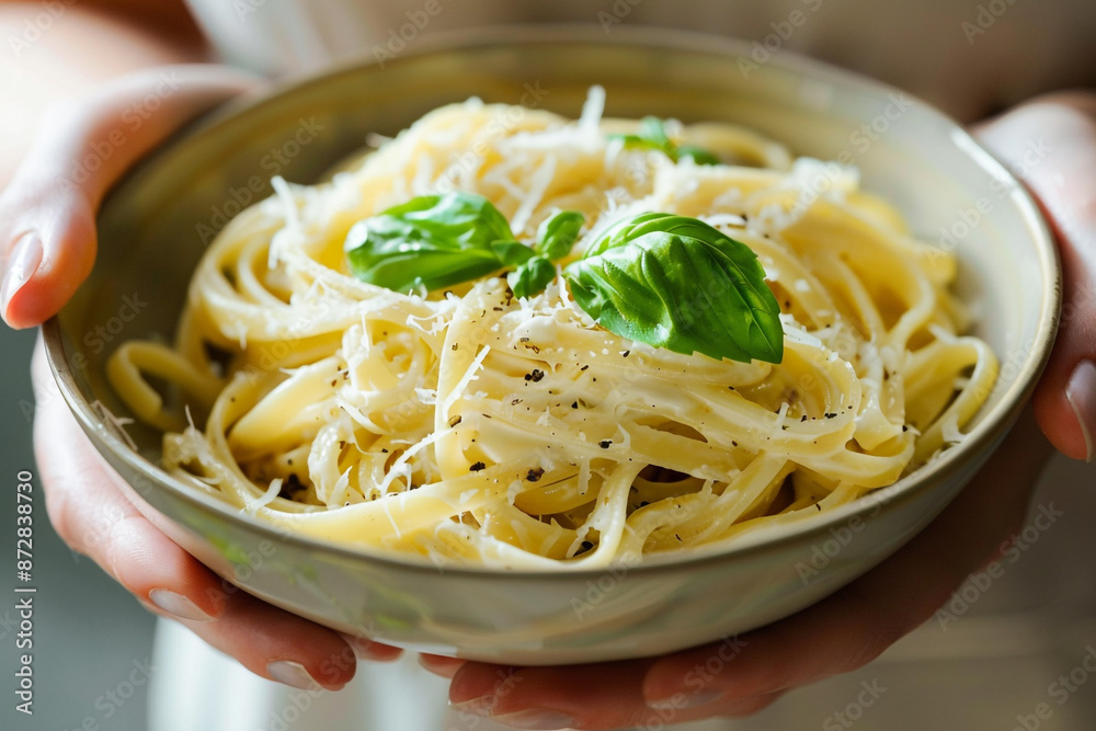 Bowl of Fettuccine Pasta with Parmesan and Basil Bowl of Fettuccine Pasta with Parmesan and Basil