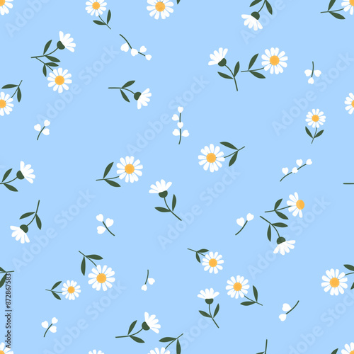 Seamless pattern with lily of the valley and daisy flower on blue background vector. Cute floral print.