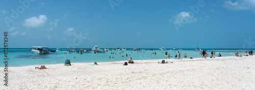 Beautiful Caribbean beach Playa Norte or North beach on the Isla Mujeres near Cancun with many yachts, Mexico photo