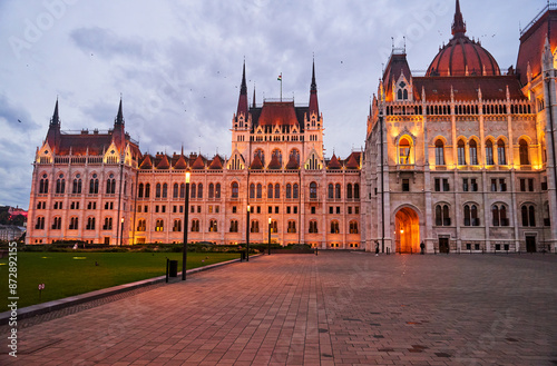 Hungarian Parliament Building in the evening at the Danube river in Budapest, Hungary. High quality photo