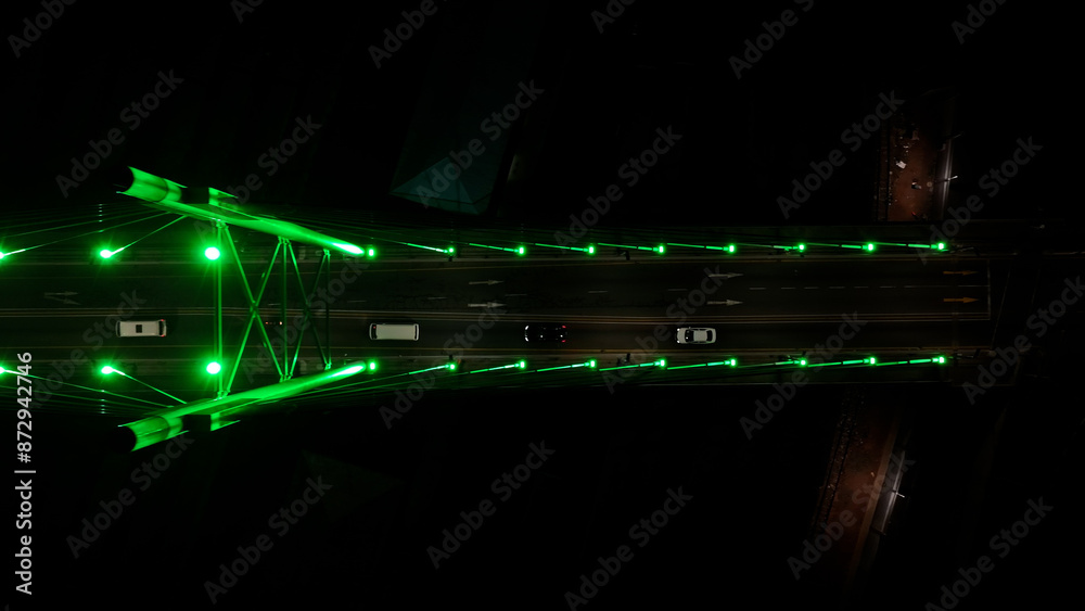 Obraz premium Nelson Mandela Bridge At Johannesburg In Gauteng South Africa. City At Night Landscape. Illuminated Cable Bridge. Johannesburg At Gauteng South Africa. Landmark Buildings. Colored Bridge.