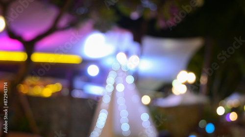 bokeh of restaurant neon light, blur nightclub background in the night