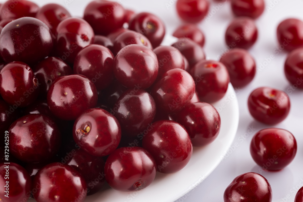 Ripe ripe cherries isolated on white background. Ripe ripe cherries isolated on white background.