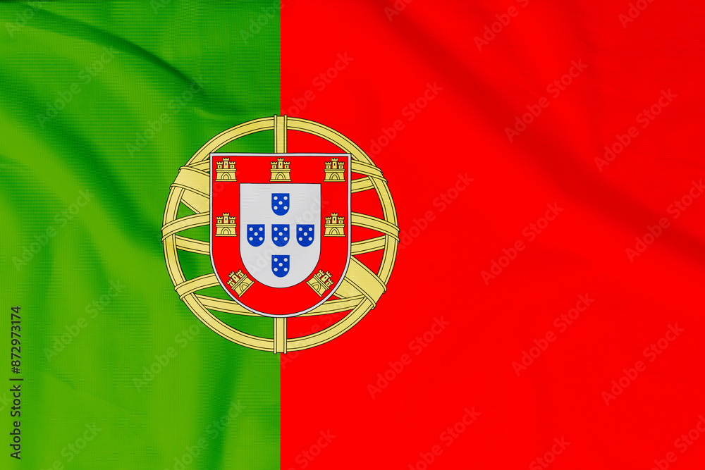 Flag of Portugal (Portuguese Republic) with natural material creases as a background