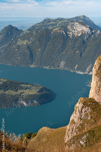 Obraz na płótnie Lake in a valley seen from Fronalpstock summit in Switzerland. Swiss Alps iconic view w salonie