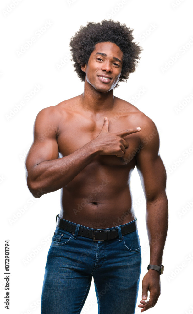 Afro american shirtless man showing nude body over isolated background cheerful with a smile of face pointing with hand and finger up to the side with happy and natural expression on face. Afro american shirtless man showing nude body over isolated background cheerful with a smile of face pointing with hand and finger up to the side with happy and natural expression on face.