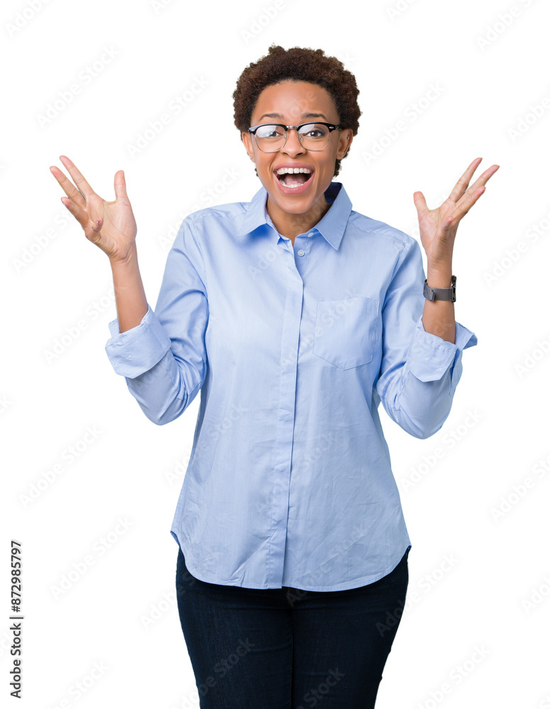 Young beautiful african american business woman over isolated background celebrating crazy and amazed for success with arms raised and open eyes screaming excited. Winner concept Young beautiful african american business woman over isolated background celebrating crazy and amazed for success with arms raised and open eyes screaming excited. Winner concept
