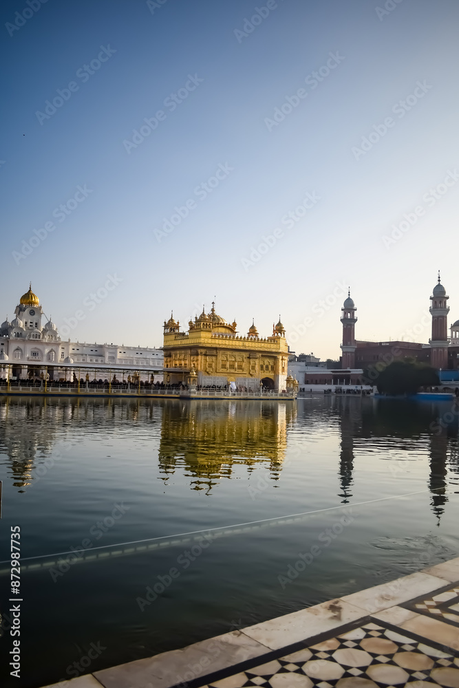 Beautiful view of Golden Temple - Harmandir Sahib in Amritsar, Punjab, India, Famous indian sikh landmark, Golden Temple, the main sanctuary of Sikhs in Amritsar, India Beautiful view of Golden Temple - Harmandir Sahib in Amritsar, Punjab, India, Famous indian sikh landmark, Golden Temple, the main sanctuary of Sikhs in Amritsar, India
