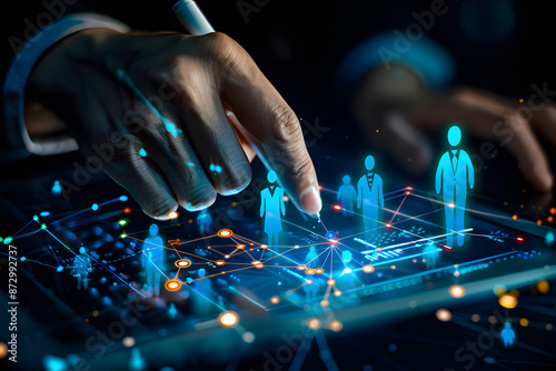 Human resource management concept. Businessmen working on tablets to find effective personnel. Human resource management (HR), recruiting, leadership, and team-building design