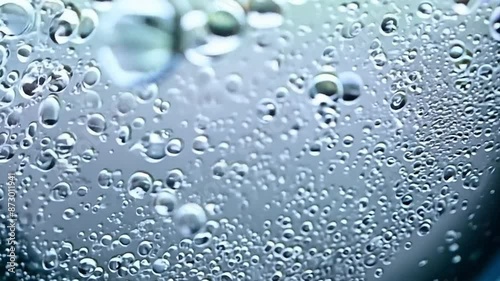 Wallpaper Mural Slow-Motion close up of soap bubbles against a black background joining together. Torontodigital.ca