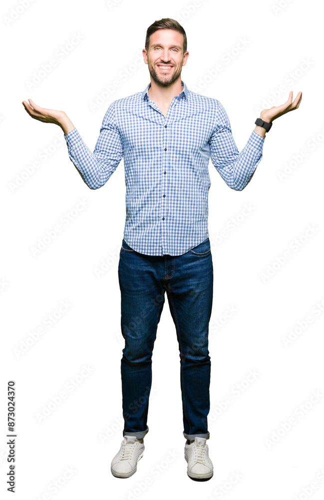 Handsome business man with blue eyes Smiling showing both hands open palms, presenting and advertising comparison and balance Handsome business man with blue eyes Smiling showing both hands open palms, presenting and advertising comparison and balance