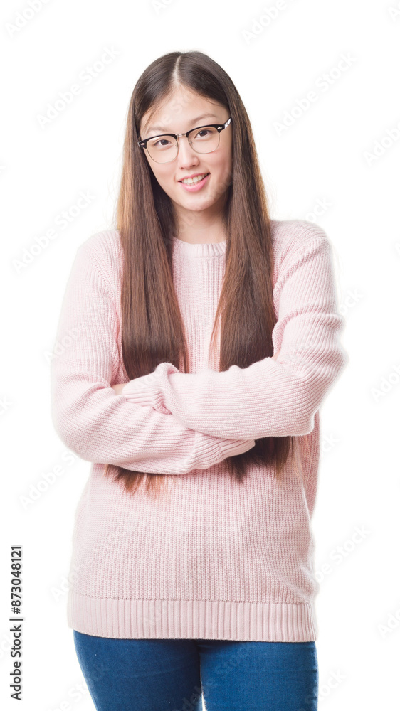 Young Chinese woman over isolated background wearing glasses happy face smiling with crossed arms looking at the camera. Positive person. Young Chinese woman over isolated background wearing glasses happy face smiling with crossed arms looking at the camera. Positive person.