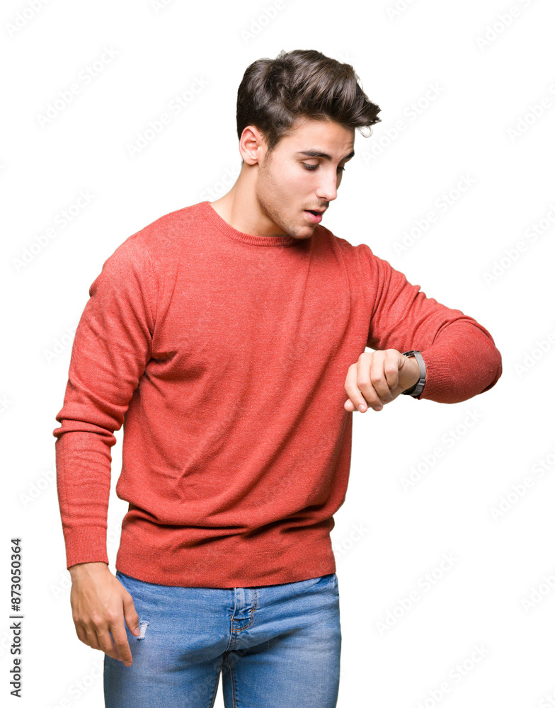 Young handsome man over isolated background Looking at the watch time worried, afraid of getting late Young handsome man over isolated background Looking at the watch time worried, afraid of getting late