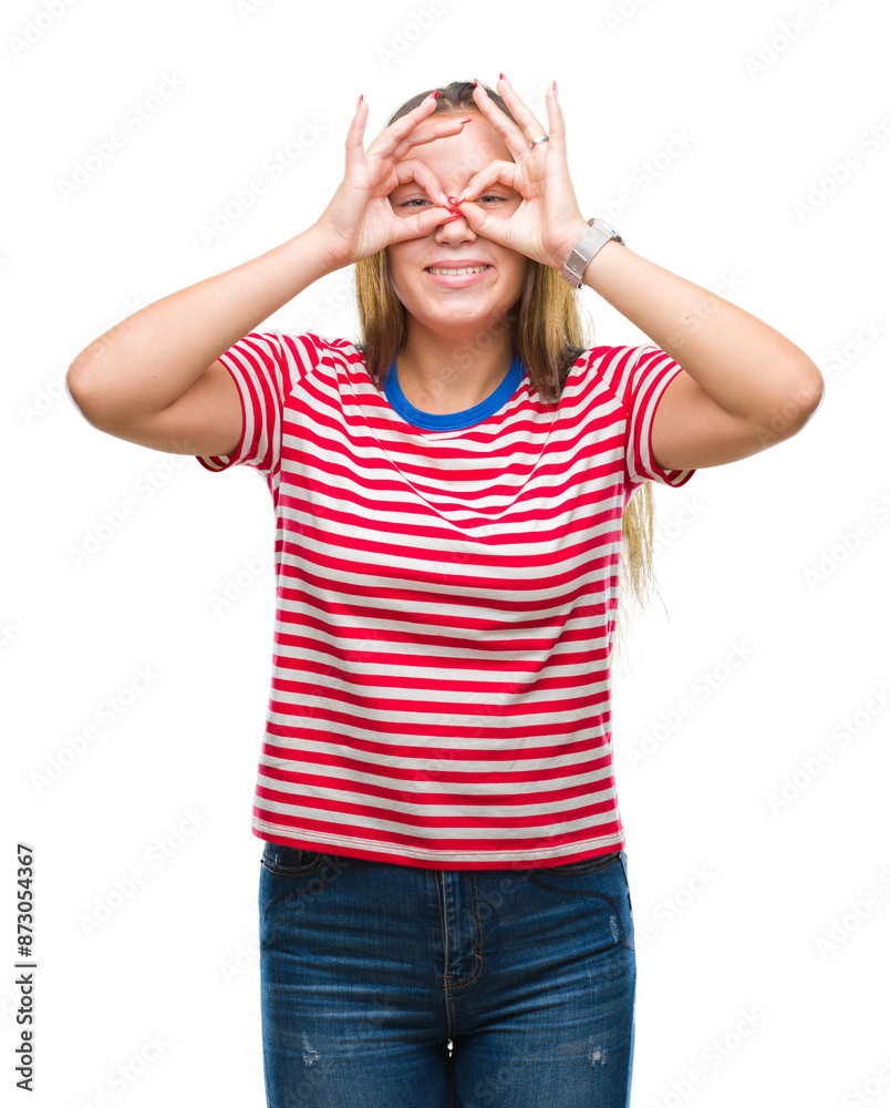Young caucasian beautiful woman over isolated background doing ok gesture like binoculars sticking tongue out, eyes looking through fingers. Crazy expression. Young caucasian beautiful woman over isolated background doing ok gesture like binoculars sticking tongue out, eyes looking through fingers. Crazy expression.