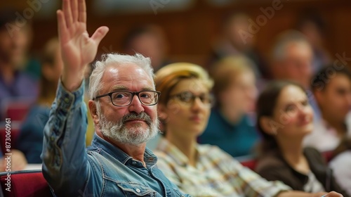 Wallpaper Mural Engaged Student Raising Hand to Ask Question in Lecture with Professor in Background Torontodigital.ca