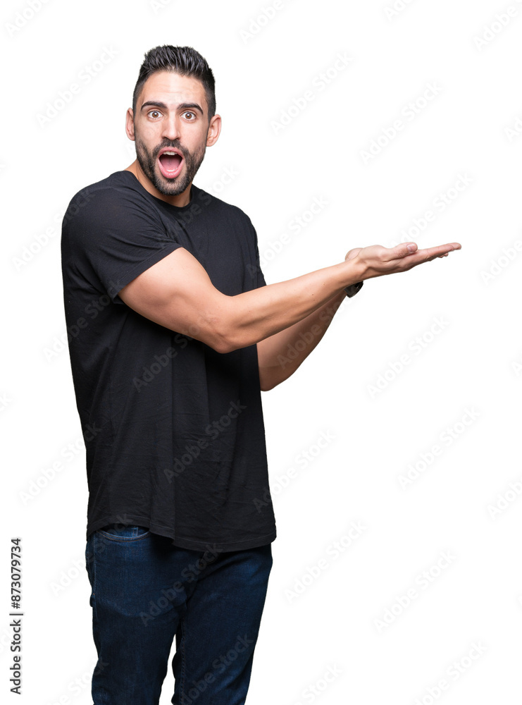 Young handsome man over isolated background Pointing to the side with hand and open palm, presenting ad smiling happy and confident Young handsome man over isolated background Pointing to the side with hand and open palm, presenting ad smiling happy and confident