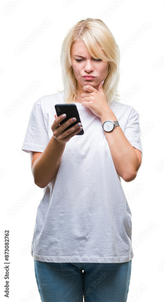 Young beautiful blonde woman using smartphone over isolated background serious face thinking about question, very confused idea