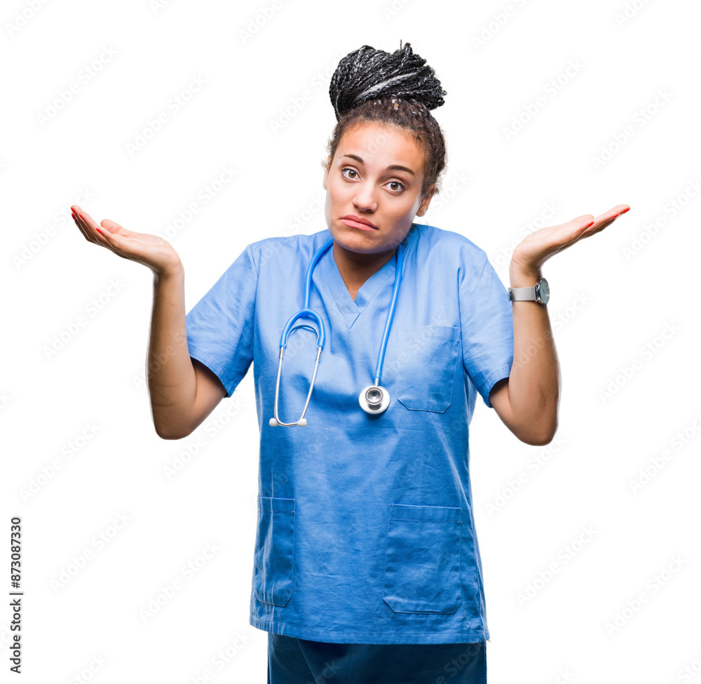 Young braided hair african american girl professional surgeon over isolated background clueless and confused expression with arms and hands raised. Doubt concept. Young braided hair african american girl professional surgeon over isolated background clueless and confused expression with arms and hands raised. Doubt concept.
