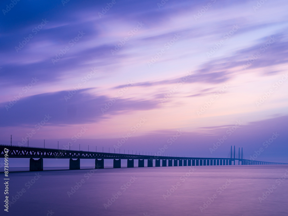 Silhouette Oeresund Bridge over sea against dramatic sky during sunset Silhouette Oeresund Bridge over sea against dramatic sky during sunset