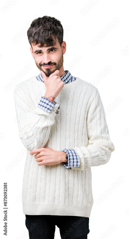 Young handsome man wearing winter sweater over isolated background looking confident at the camera with smile with crossed arms and hand raised on chin. Thinking positive. Young handsome man wearing winter sweater over isolated background looking confident at the camera with smile with crossed arms and hand raised on chin. Thinking positive.