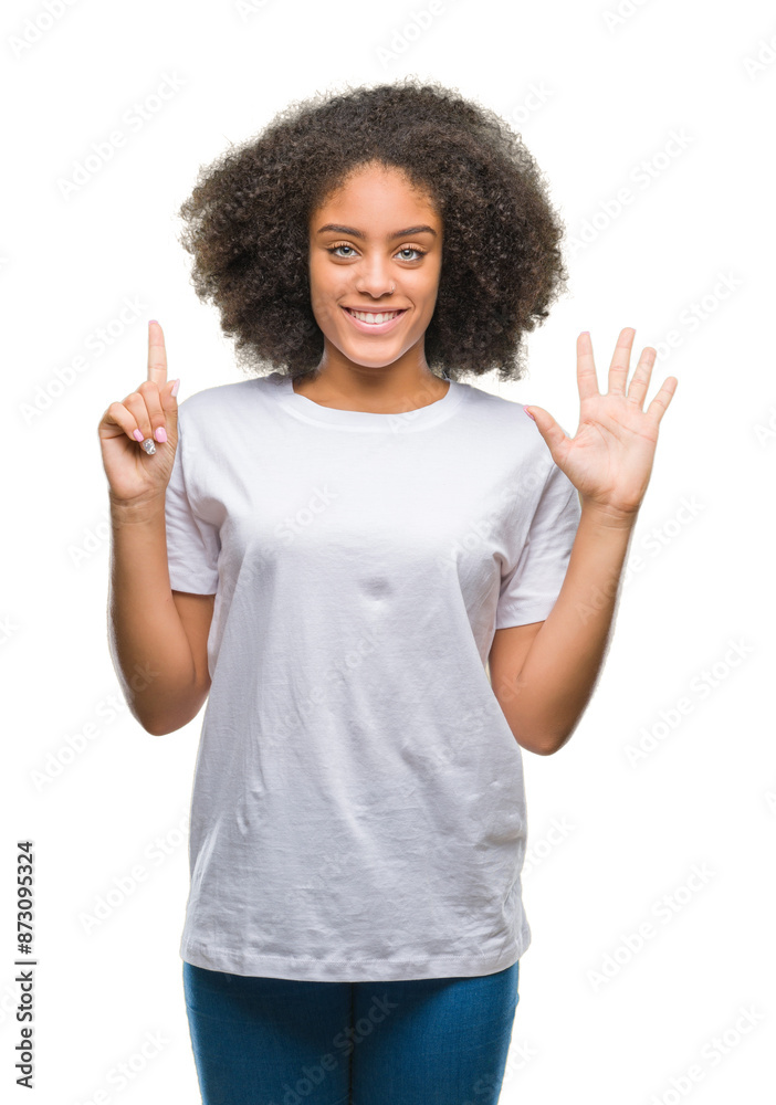 Young afro american woman over isolated background showing and pointing up with fingers number six while smiling confident and happy. Young afro american woman over isolated background showing and pointing up with fingers number six while smiling confident and happy.