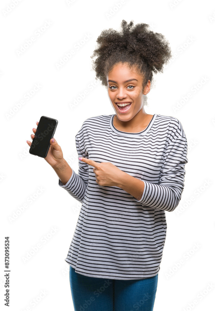Young afro american woman texting using smartphone over isolated background very happy pointing with hand and finger Young afro american woman texting using smartphone over isolated background very happy pointing with hand and finger