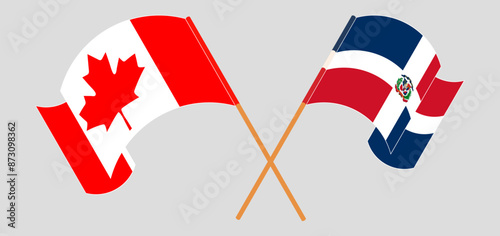 Crossed and waving flags of Canada and Dominican Republic