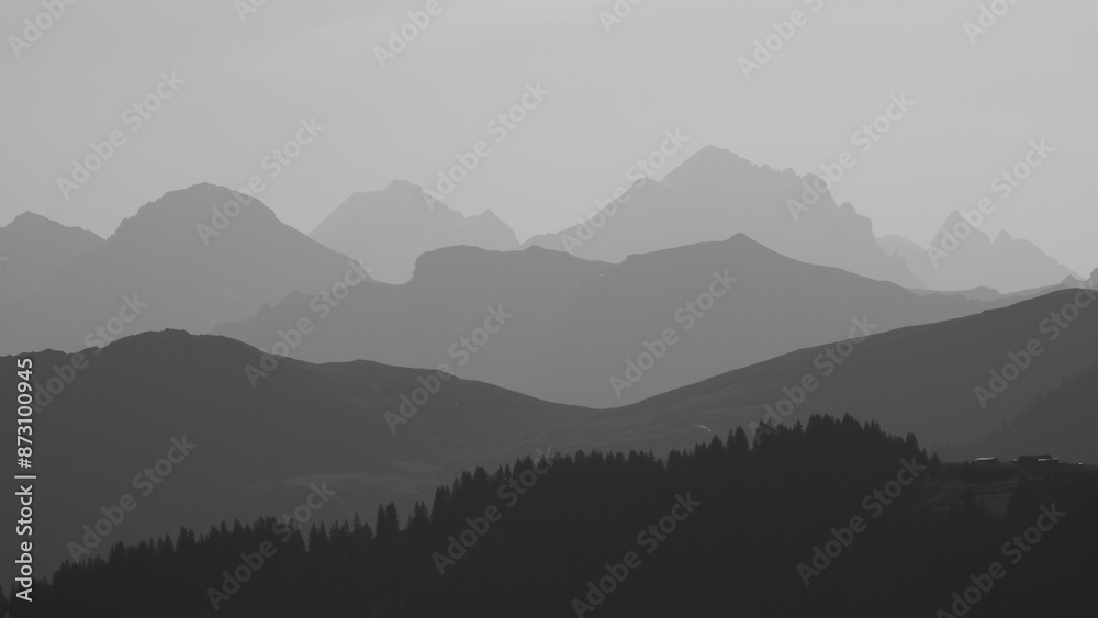Naklejka premium Dream like mountain ranges in the morning light seen from Vorder Walig, Switzerland.