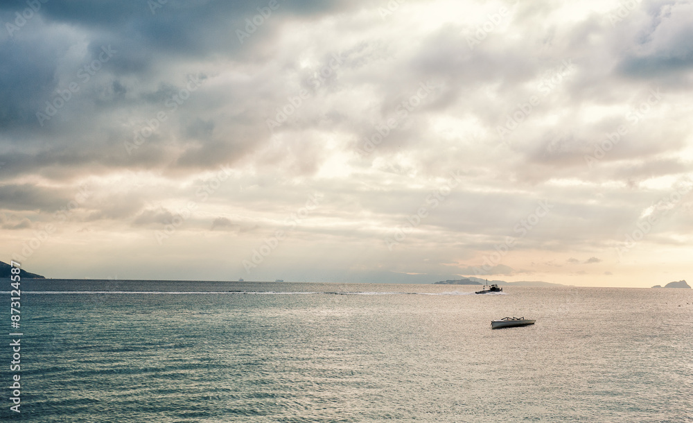Obraz premium Beautiful landscape with dramatic sky, sea water and islands
